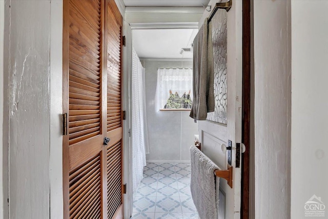 bathroom featuring tile patterned floors and visible vents