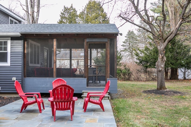 view of patio / terrace with a sunroom