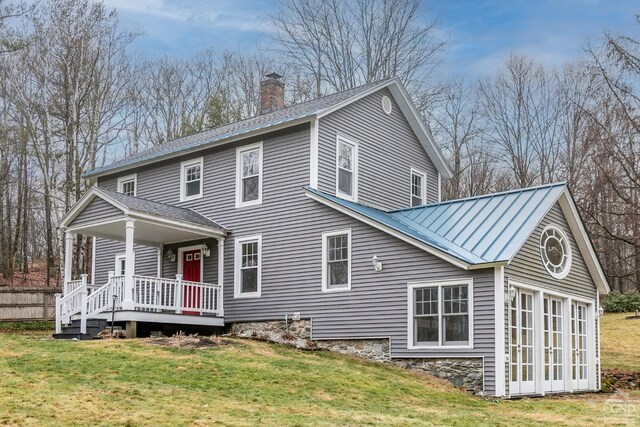 exterior space with a front lawn