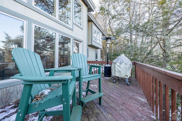 view of snow covered deck