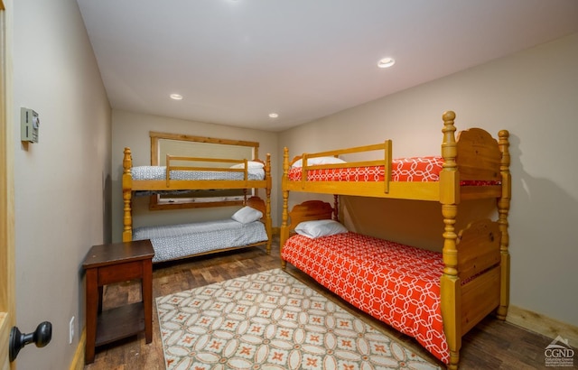 bedroom with wood-type flooring