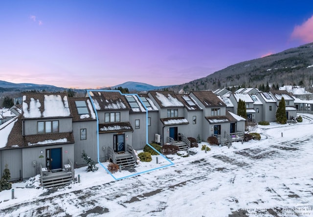 exterior space featuring a mountain view