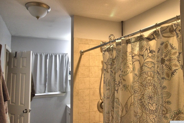 bathroom with a shower with curtain