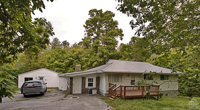 view of front of property with a deck