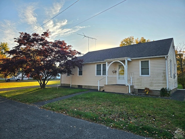 view of front of house with a lawn