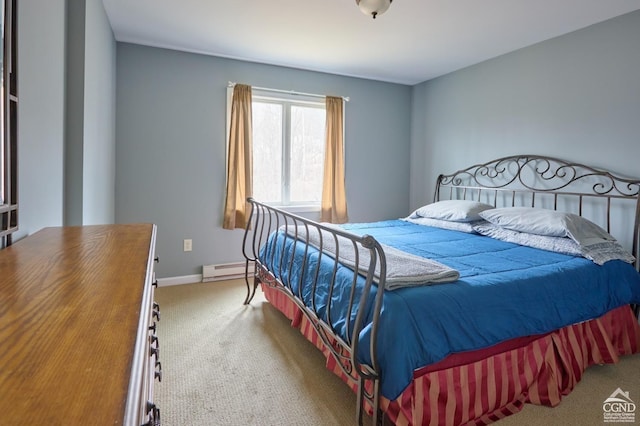 carpeted bedroom featuring a baseboard radiator