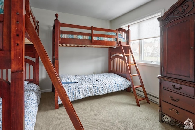 carpeted bedroom with baseboard heating