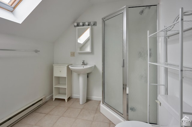 bathroom with an enclosed shower, lofted ceiling with skylight, and a baseboard radiator