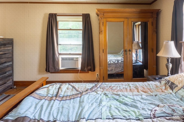 bedroom featuring french doors and cooling unit