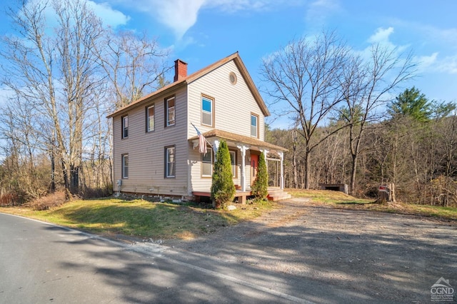 view of home's exterior featuring a porch