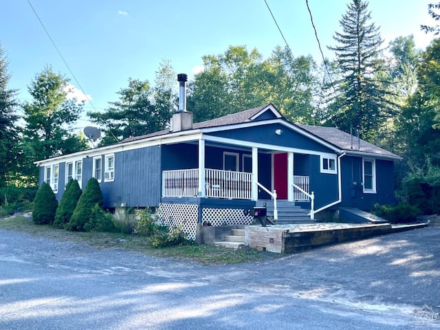 view of front of home featuring covered porch