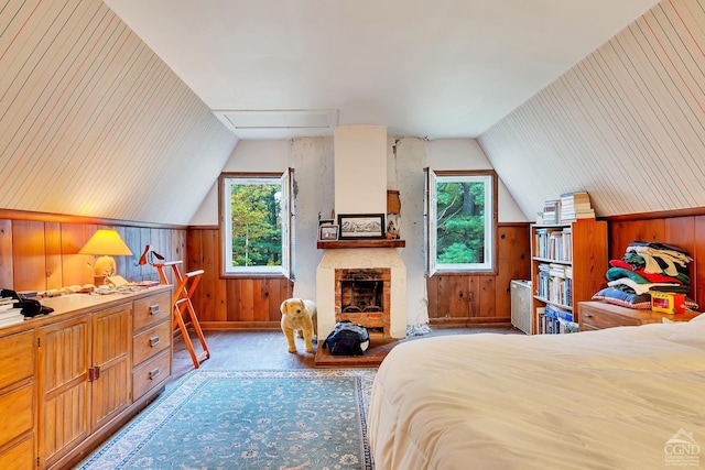 105 Gaf Lake Rd, Sanford, NY 13865 - carpeted bedroom with multiple windows, lofted ceiling, and wood walls