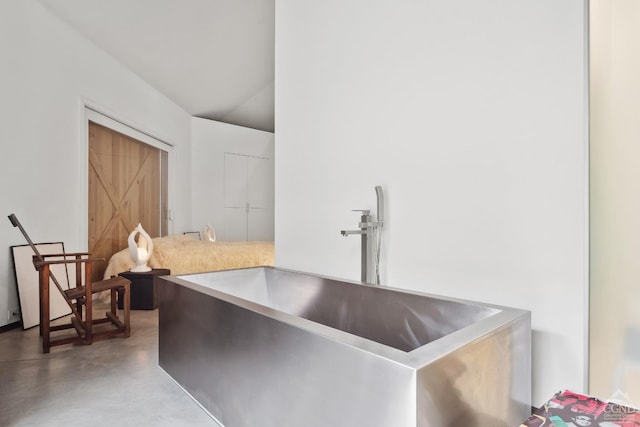 room details featuring a sink and finished concrete floors