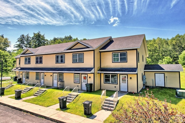 view of front of property with a front lawn