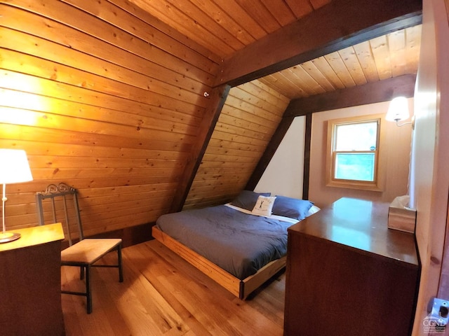 bedroom featuring wood ceiling, lofted ceiling with beams, and wood-type flooring