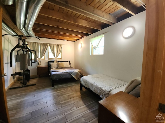 bedroom featuring hardwood / wood-style floors, wooden ceiling, beamed ceiling, and multiple windows