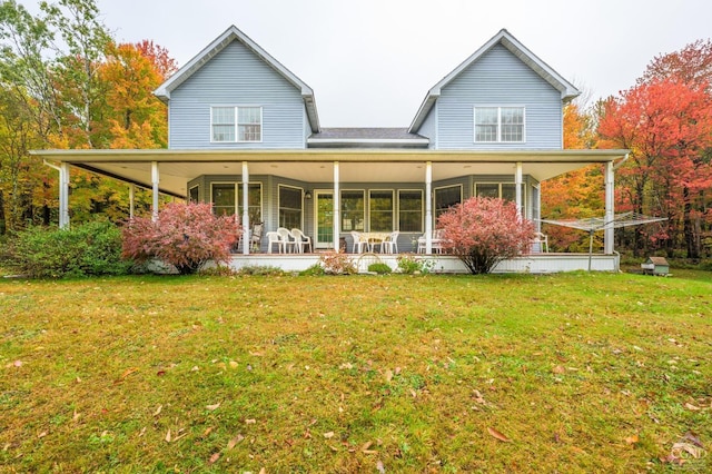 back of house with a lawn and a porch