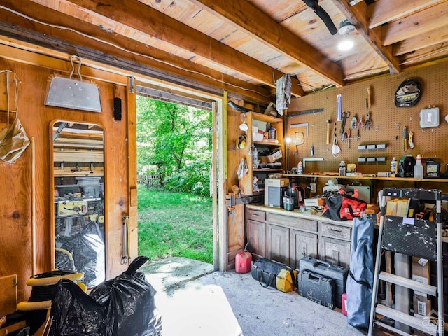 miscellaneous room featuring a workshop area