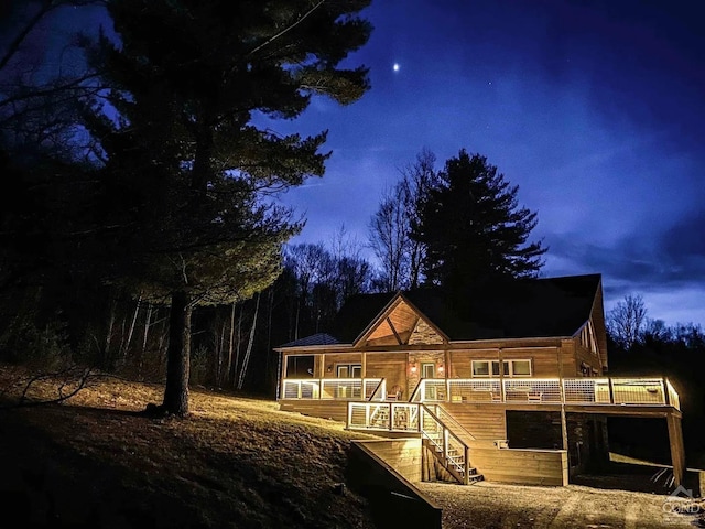 exterior space featuring a wooden deck