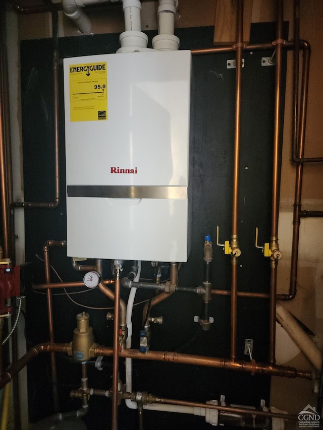 utility room with water heater