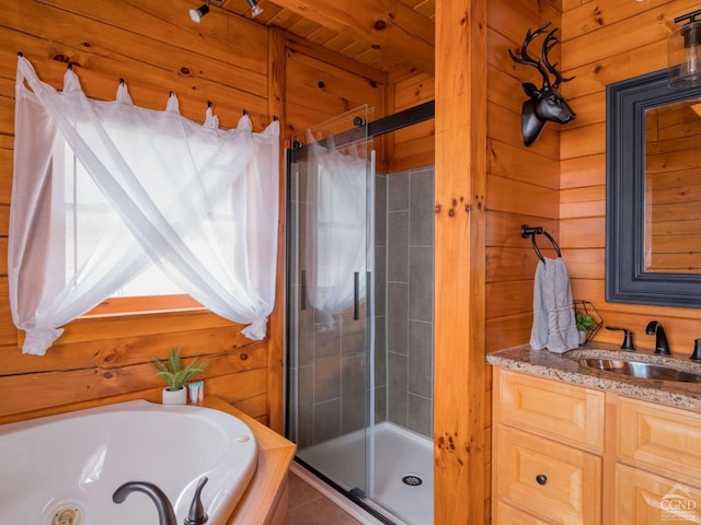 bathroom with vanity, wood walls, wood ceiling, and plus walk in shower