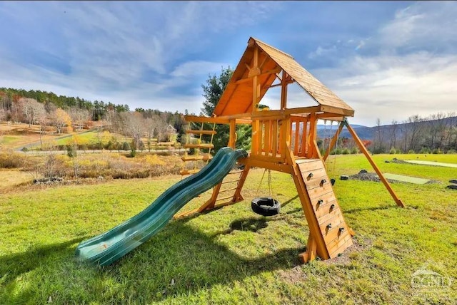 view of jungle gym featuring a yard