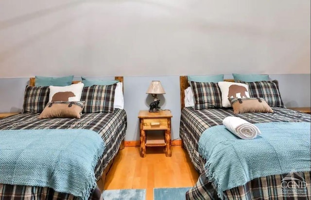 bedroom featuring hardwood / wood-style flooring