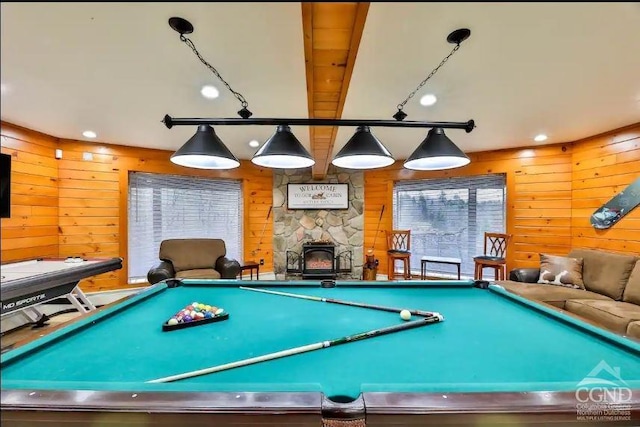 recreation room featuring wood walls, beam ceiling, and billiards