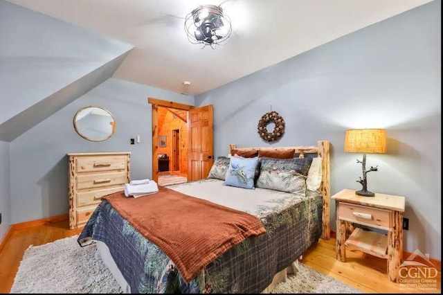 bedroom with light hardwood / wood-style floors