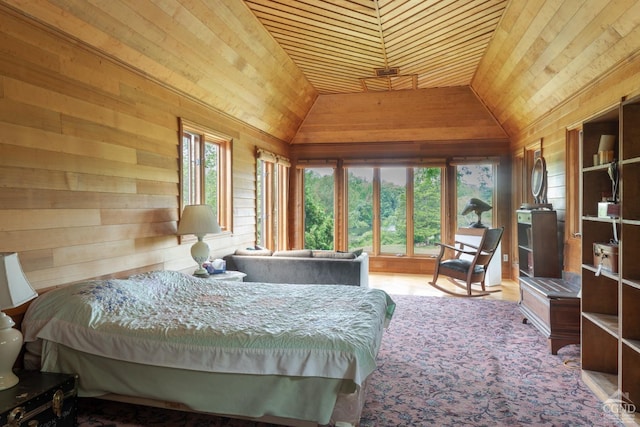 bedroom with lofted ceiling, wooden walls, and wood ceiling