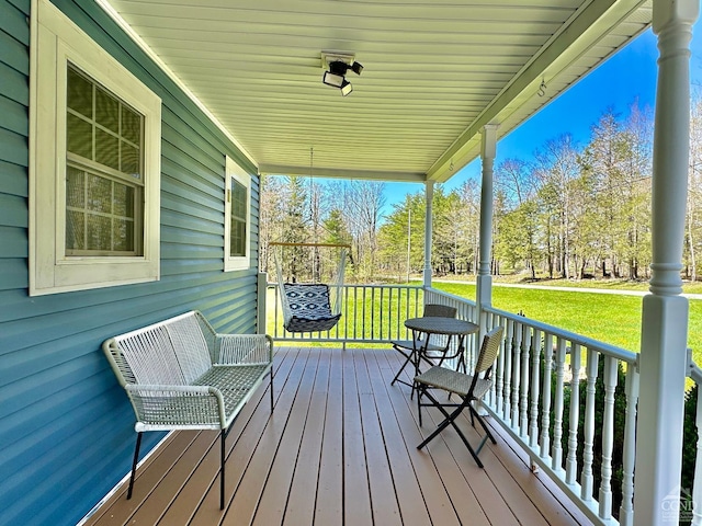 wooden deck with a porch