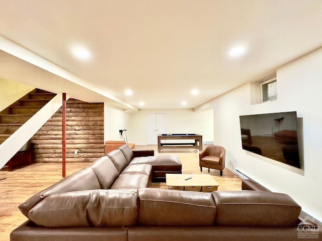 living room with wood-type flooring and pool table