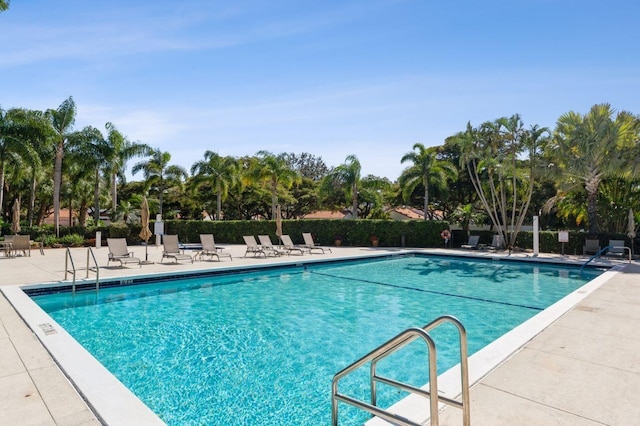 17031 Boca Club Blvd Unit 082A, Boca Raton, FL 33487 - view of swimming pool featuring a patio