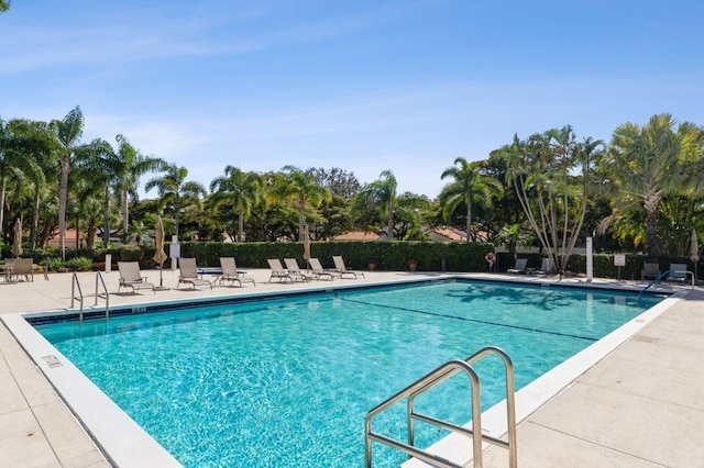 view of swimming pool featuring a patio