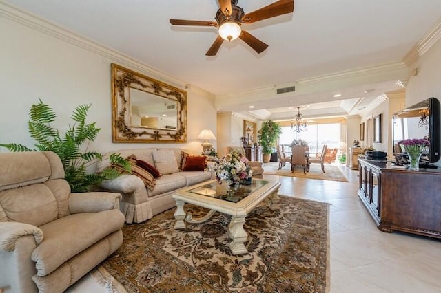 living room featuring ceiling fan with notable chandelier, light tile patterned floors, and crown molding