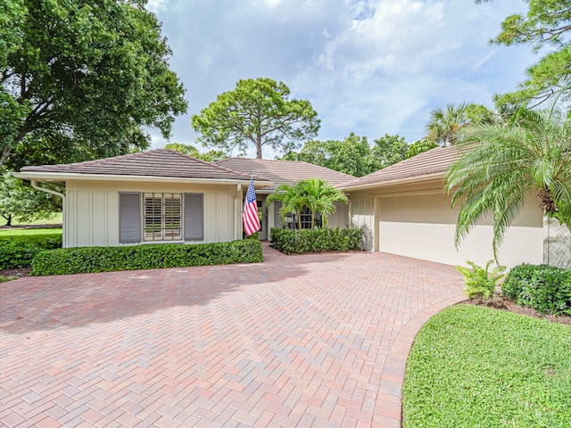 ranch-style house with a garage