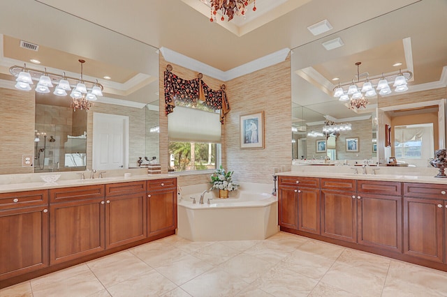 bathroom featuring crown molding, vanity, tile walls, and shower with separate bathtub