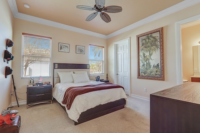 bedroom featuring ceiling fan, crown molding, light carpet, and multiple windows