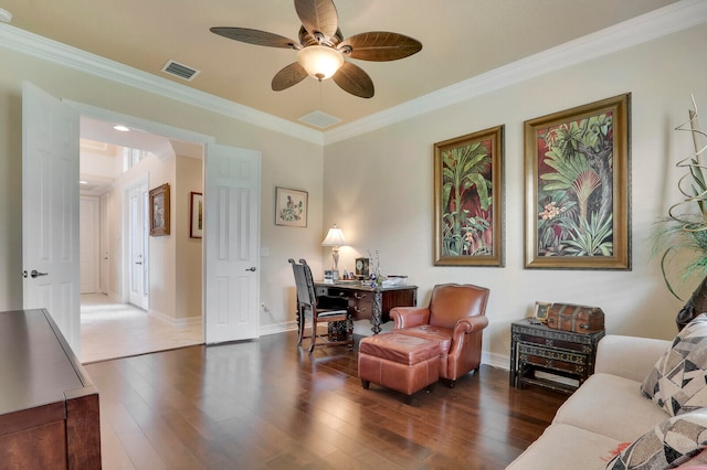 living room with dark hardwood / wood-style floors, ceiling fan, and crown molding