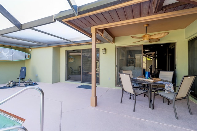 view of patio with a lanai and ceiling fan