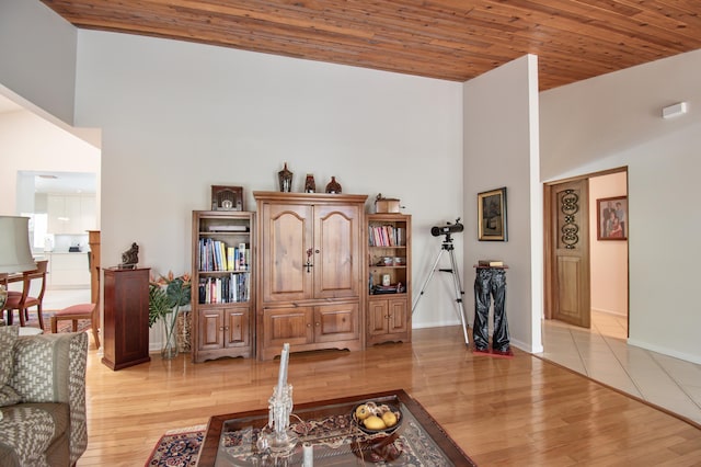 3961 NW 27th Ave, Boca Raton, FL 33434 - living room featuring a towering ceiling, light wood finished floors, and wooden ceiling