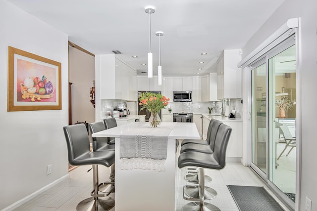3961 NW 27th Ave, Boca Raton, FL 33434 - dining area featuring light tile patterned flooring and recessed lighting