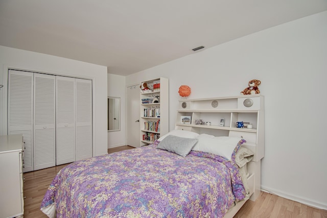 3961 NW 27th Ave, Boca Raton, FL 33434 - bedroom with wood finished floors and a closet