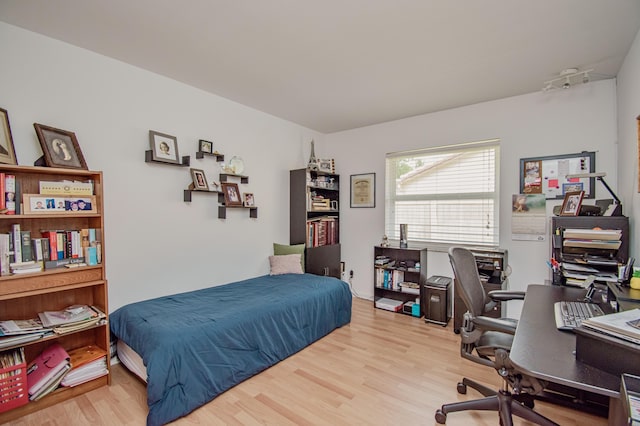 3961 NW 27th Ave, Boca Raton, FL 33434 - bedroom with wood finished floors and an office area