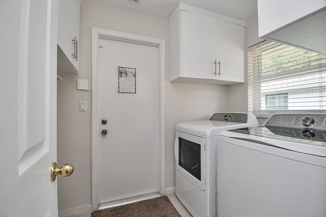 3961 NW 27th Ave, Boca Raton, FL 33434 - washroom with washer and dryer and cabinet space