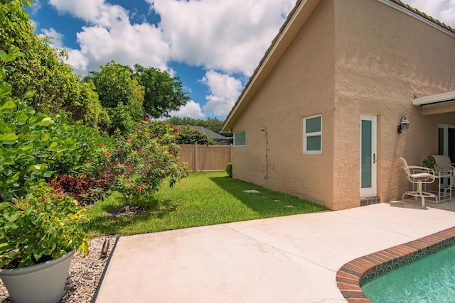 3961 NW 27th Ave, Boca Raton, FL 33434 - back of house with a patio area and stucco siding