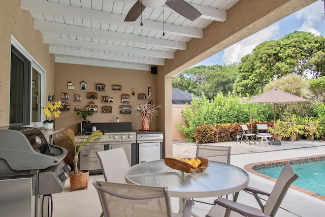 3961 NW 27th Ave, Boca Raton, FL 33434 - view of patio / terrace with outdoor dining area, an outdoor kitchen, ceiling fan, and an outdoor pool