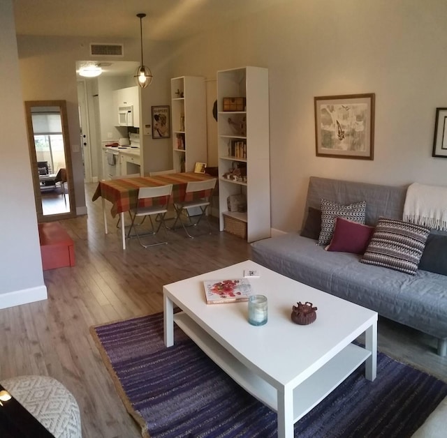 4784 S Central St Unit 16, Jupiter, FL 33458 - living room featuring wood finished floors