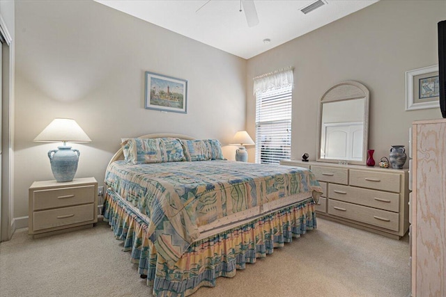 carpeted bedroom with ceiling fan