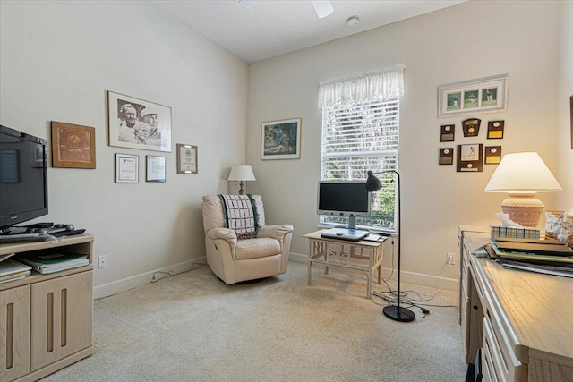 office with light colored carpet and ceiling fan